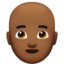 Mann: mitteldunkle Hautfarbe, Glatze-Emoji auf Apple