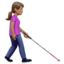Emoji Wanita dengan tongkat: warna kulit sedang, menghadap kanan di Apple