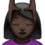 Woman Getting Massage: Dark Skin Tone emoji on Apple