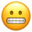 Emoji Cara haciendo una mueca en Apple