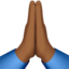 Folded Hands: Medium-Dark Skin Tone emoji on Apple