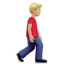 Emoji Uomo che cammina: carnagione abbastanza chiara e a destra su Apple