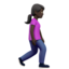 Emoji Femme qui marche : peau foncée et vers la droite sur Apple