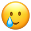 Emoji Faccina sorridente con lacrima su Apple