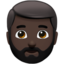 Mann: dunkle Hautfarbe, Bart-Emoji auf Apple