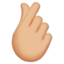 Emoji Mano con indice e pollice incrociati: carnagione abbastanza chiara su Apple