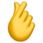Emoji Mano con indice e pollice incrociati su Apple