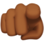 Index Pointing at the Viewer: Medium-Dark Skin Tone emoji on Apple