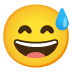 Grinning Face with Sweat emoji on Google