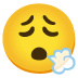 Emoji Muka menghembuskan nafas pada Google