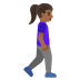 Woman Walking Facing Right: Medium-Dark Skin Tone emoji on Google