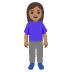 Woman Standing: Medium Skin Tone emoji on Google