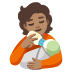 Person Feeding Baby: Medium Skin Tone emoji on Google
