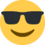 Emoji Faccina con sorriso e occhiali da sole su X / Twitter